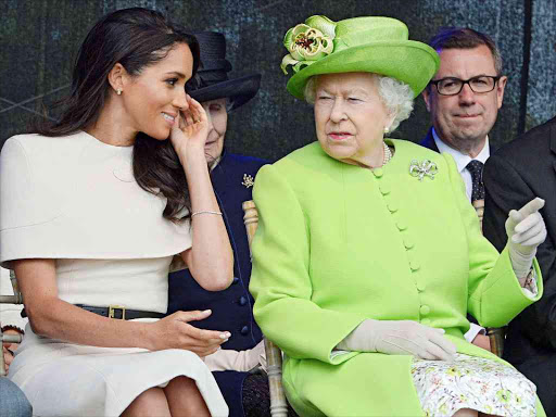 Britain's Queen Elizabeth and Meghan,The Duchess Of Sussex, attend the opening of the Mersey Gateway Bridge in Runcorn, June 14, 2018. /REUTERS