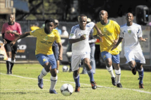 SMACK: Powerlines keeper Thabang Louw during the Nedbank Cup last 32 match between Powerlines FC and Mamelodi Sundowns at GWK Stadium yesterday in Kimberley. PHOTO: Gallo Images