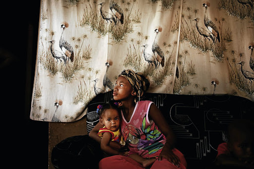 NEVER KNEW N|UU Fiona and Ava Seekoei, family of Griet Seekoei, at their home near Upington