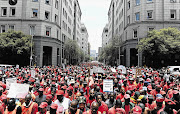 Cosatu members protest against e-tolling in Pretoria in 2012. File photo