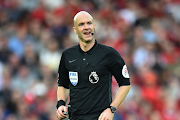 Referee Anthony Taylor sent off James after reviewing a goal-line clearance and awarding a penalty which Liverpool's Mohamed Salah converted to cancel out Kai Havertz's opener.