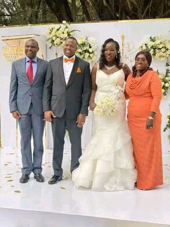 Head of Public Service and State House Chief of Staff Felix Koskei poses for a picture with David Samoei and his spouse Carol Kitur at Fairmont Mt Kenya Safari Hotel in Nyeri during their wedding on December 15, 2023.