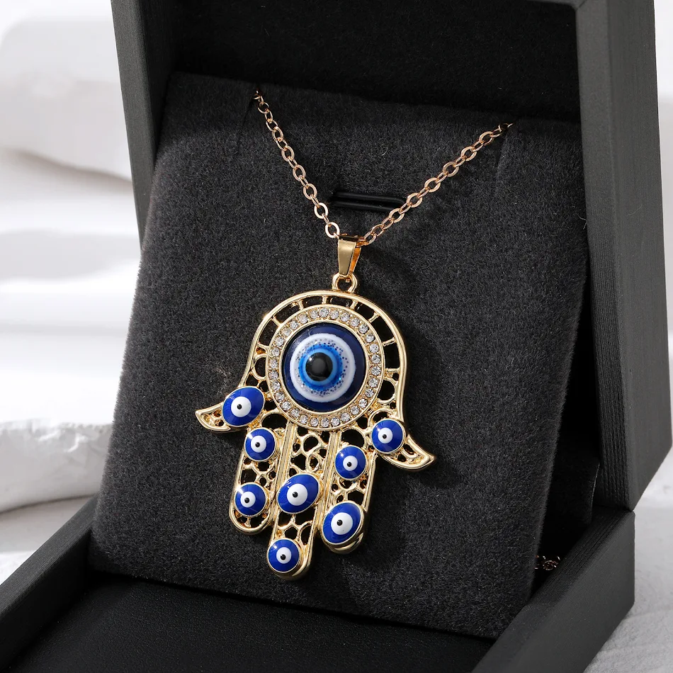 Collier vintage œil du diable style ethnique, main de Fatma creuse, pendentif yeux bleus turcs, protection