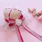 Straw hat with red ribbon and