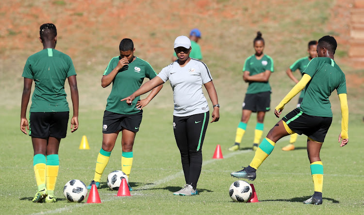 SA women's Under-17 national team head coach Simphiwe Dludlu with her players during a training session in October.