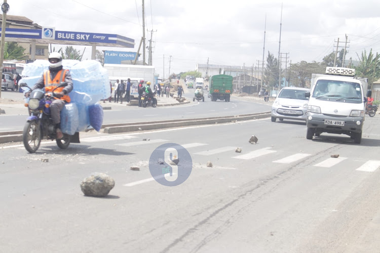 Stones seen along Likoni road thrown by youths during the Azimio protests on March 20, 2023.