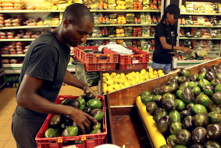 Workers unpack avocados at a fruit and vegetable shop in Harare, Zimbabwe, October 17 2017. Picture: PHILIMON BULAWAYO/REUTERS