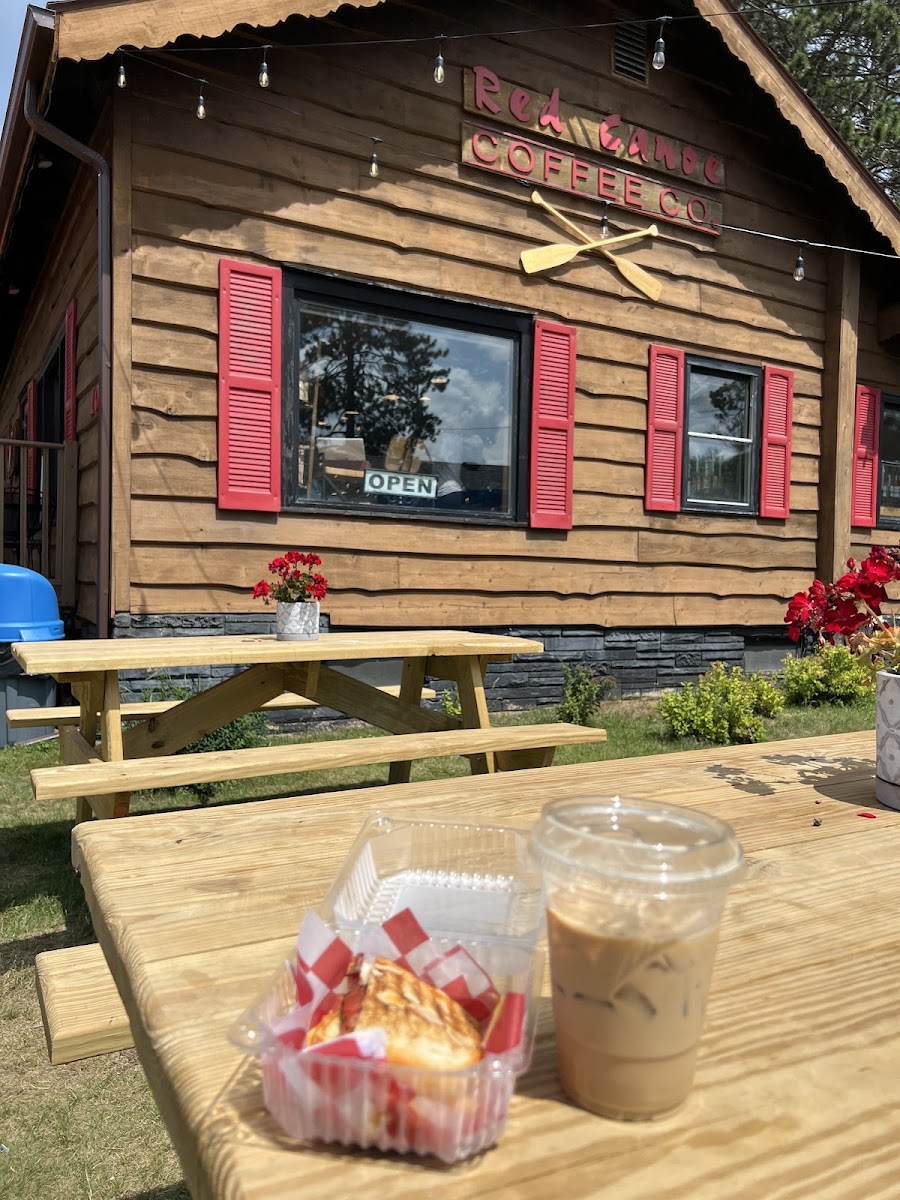 Outside sitting area with my panini and iced latte to go.