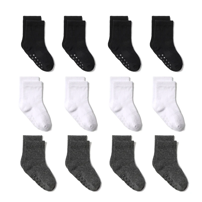 Chaussettes de Sol Enfant en Coton Couleur Unie, Antidérapantes et Confortables, Idéales pour Jouer et Explorer en Toute Sécurité à la Maison.
