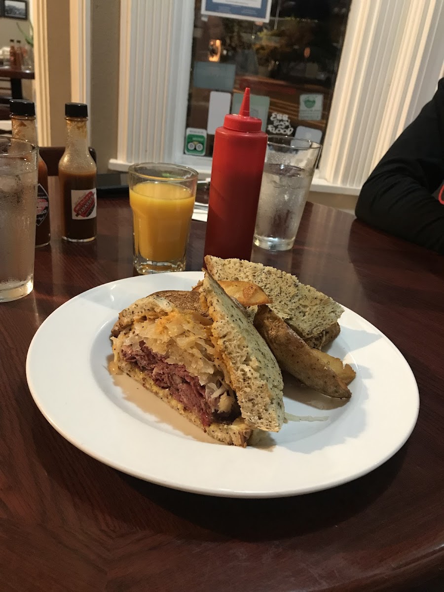 Reuben sandwich with steak fries