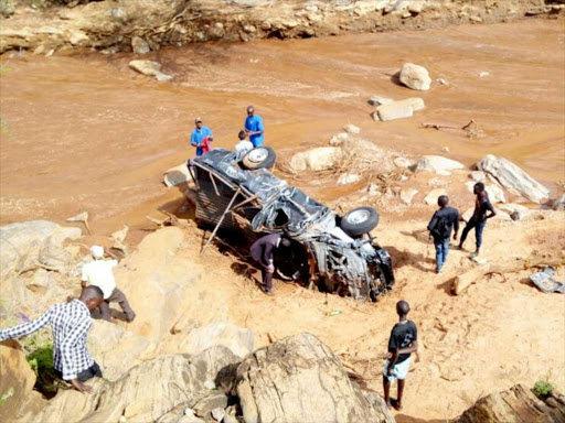 The wreckage of a vehicle that was swept away by floods as it crossed Lengusaka River in Samburu East on Monday night. Two people who were on the vehicle are still missing. /MARTIN RWAMBA