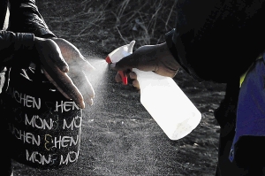 Regular sanitising and wearing masks in public spaces have helped restrain the annual flu season this year. / Gallo Images/Lefty Shivambu