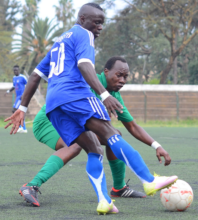 City stars' Jimmy Bageya challenges Hamidu Kwizera of Sony during their season finale match at City stadium