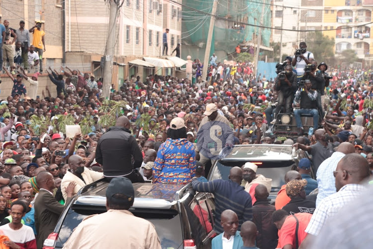 Azimio Chief Raila Odinga and Narc-Kenya party leader Martha Karua with protestors in Pipeline area Nairobi on March 30,2023.