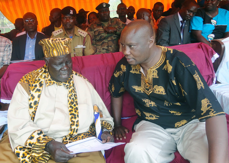 Busia governor Sospeter Ojamong with Teso MP Augustine Osuban at a past Teso Culutural Festive in Kakapel