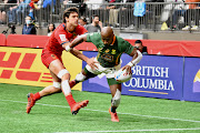 Siviwe Soyizwapi of South Africa in action against Spain on day 1 of the HSBC Canada Sevens in Vancouver, Canada on April 16 2022.