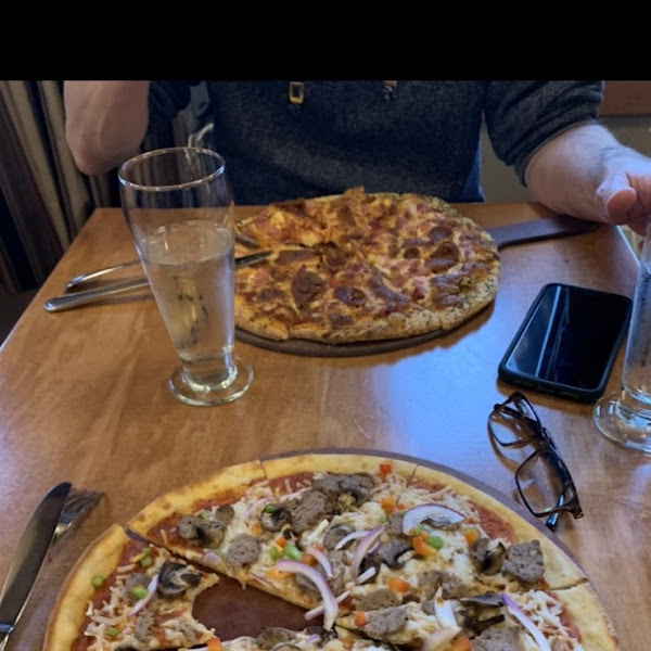 Had a bite before posting but you can see how the crust is, super good and look the same size as my husbands pizza, bonus!!