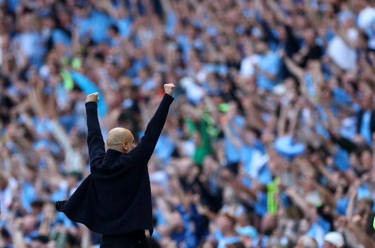 Manchester City manager Pep Guardiola celebrates after Julian Alvarez scores against Chelsea at Etihad Stadium in Manchester, Britain, May 21 2023. Picture: LEE SMITH/REUTERS