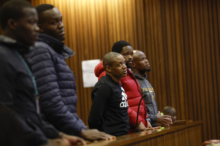 The five accused in the Senzo Mayiwa murder trial stand in the dock at the Pretoria high court on July 17 2023. File photo.