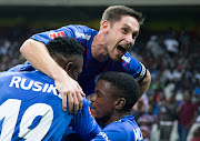 SuperSport United captain Dean Furman celebrates with teammates. 