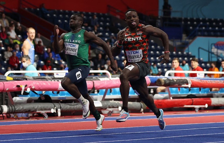 Ferdinand Omanyala of Kenya and Israel Olatunde of Ireland IRE compete during the Men's 60 Metres Heats on Day Two of the World Athletics Indoor Championships Belgrade.