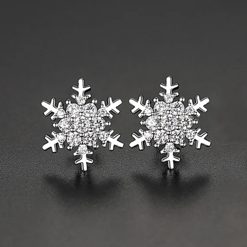 Zirconium snowflake earrings in copper. Winter elegance with a unique sparkle. Sophisticated jewelry perfect for special