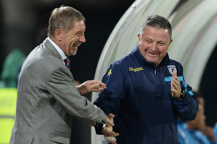 A file photo of Stuart Baxter (L) and Bidvest Wits coach Gavin Hunt (R) sharing some light moments during an Absa Premiership match when the former was still head coach of SuperSport United.