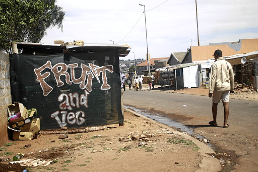 Calm has returned to Munsieville, Krugersdorp, after a mob invaded Dr Yusuf Dadoo Hospital yesterday to attack a suspect in a stabbing incident at local bar.