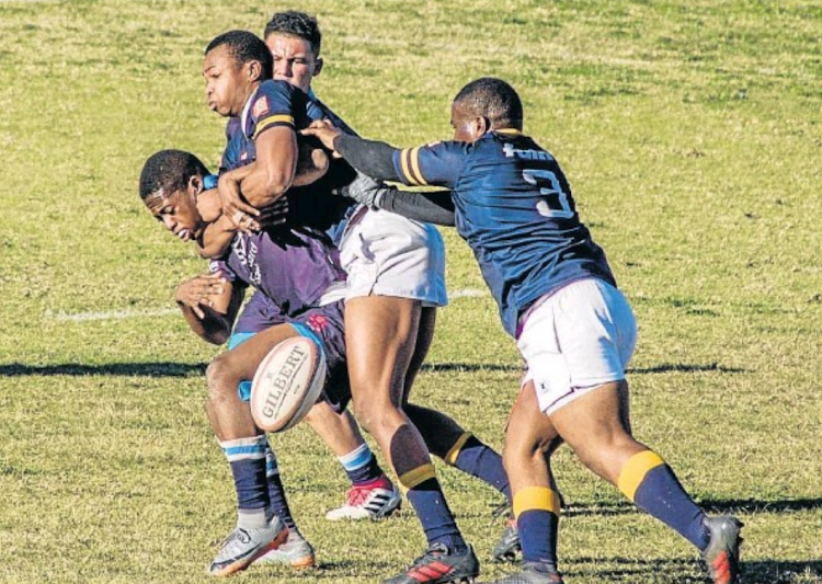 Graeme College players Intle Mancoko and Bavu Manyakanyaka, right, move in for a tackle in their clash with Muir in 2018. Both teams will play in the Pam Golding Properties Graeme Rugby Day in Grahamstown on Saturday