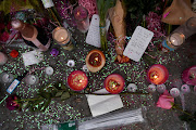 A makeshift memorial for the concertgoers who died in a stampede during a Travis Scott performance at the 2021 Astroworld Festival grows in Houston, Texas, US, November 9, 2021.  