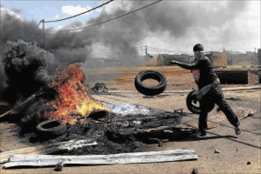 VOLATILE SITUATION: Westonaria local municipality, which includes protest-hit Bekkersdal, is apparently owed millions Photo: Alon Skuy