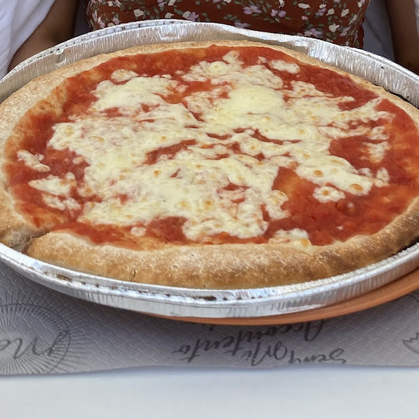 Pizza margherita with foil tray