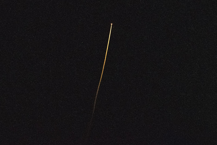 SpaceX Crew Dragon spacecraft Endurance is seen as it returns from space off the coast of Florida after 175 days aboard the Space Station.