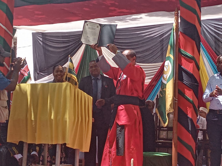 Lamu county deputy governor elect Raphael Munyua is sworn into office by High Court Judge Stephen Githinji at the Mkunguni Square in Lamu Island on Thursday, August 25,2022.