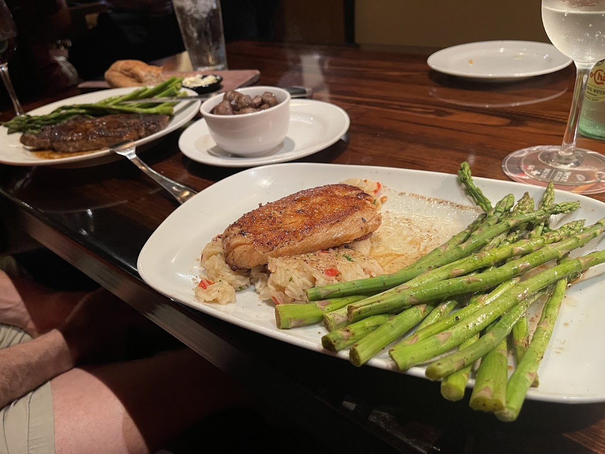 Grilled salmon, rice, pilaf, grilled asparagus, sautéed mushrooms. Everything was gluten and dairy free for me.