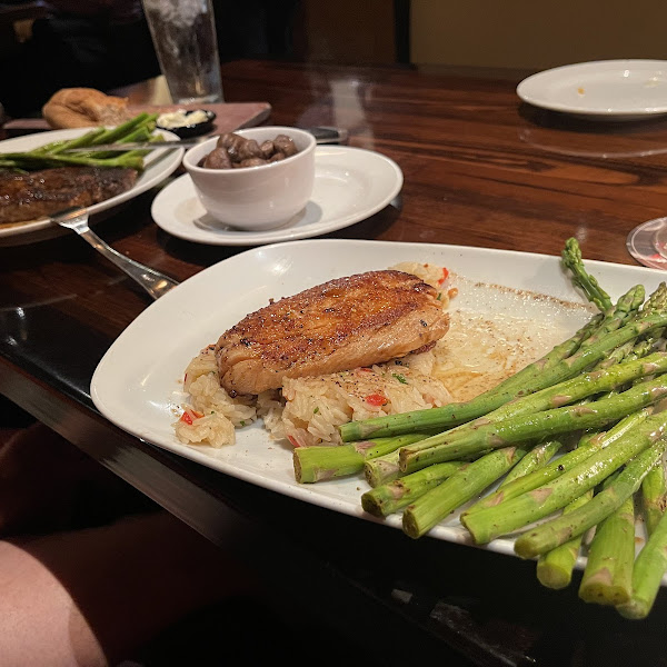 Grilled salmon, rice, pilaf, grilled asparagus, sautéed mushrooms. Everything was gluten and dairy free for me.