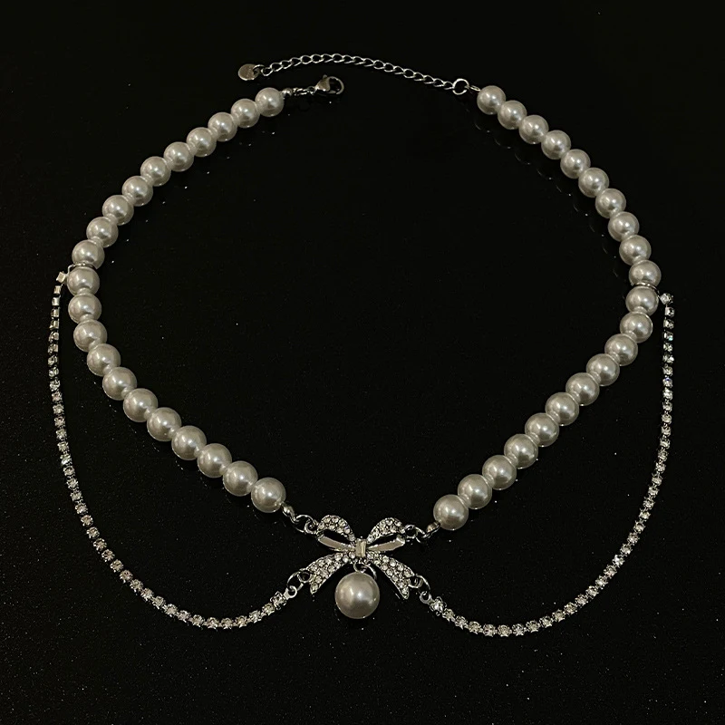 Dames Bow Stitching parelketting, een elegant sieraad om je stijl te versterken. Perfect voor speciale gelegenheden, een vleugje verfijning.