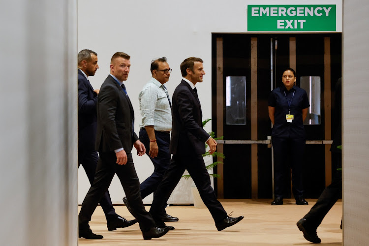 French President Emmanuel Macron walks to attend a press conference on the sidelines of the G20 Summit in New Delhi, India, September 10 2023. Picture: ADNAN ABIDI/REUTERS