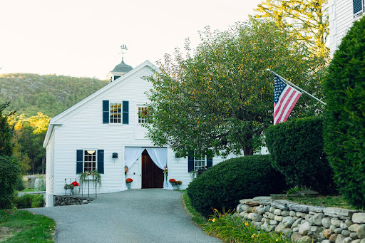 white house with American flag in this luxury house for sale in Camden ($3,450,000)