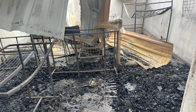 The remains of a dormitory that was razed on fire by unknown arsonists at Garissa High School in November last year.