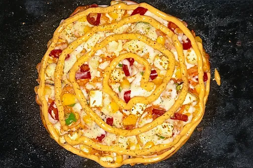 The Peppiest Paneer Cheesy Pizza