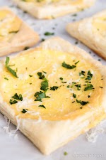 Baked Egg Goat Cheese Puff Pastry was pinched from <a href="http://domesticallyblissful.com/baked-egg-goat-cheese-puff-pastry/?utm_source=P-1915" target="_blank" rel="noopener">domesticallyblissful.com.</a>