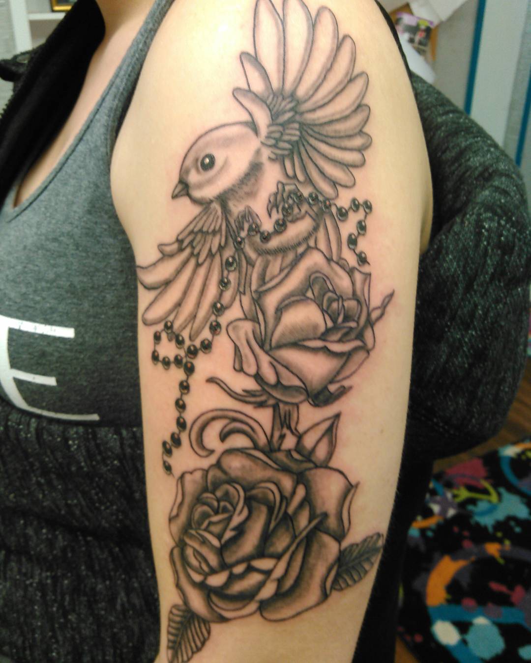 Flying Bird With Roses Tattoo