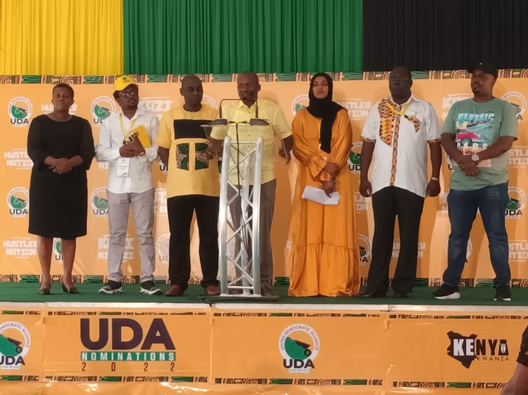 UDA National Election Board chairman Antony Mwaura flanked by party officials gives a status update on party primaries during a press conference at Hustlers Center, Nairobi on April 14, 2022.