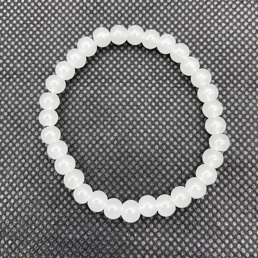 Title 7, Natural white marble bracelet featuring transpa...