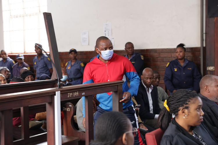 KwaZulu-Natal police sergeant Mbuyiseni Gema, 48, who allegedly strangled to death his pregnant girlfriend, appeared in a packed courtroom on Friday.