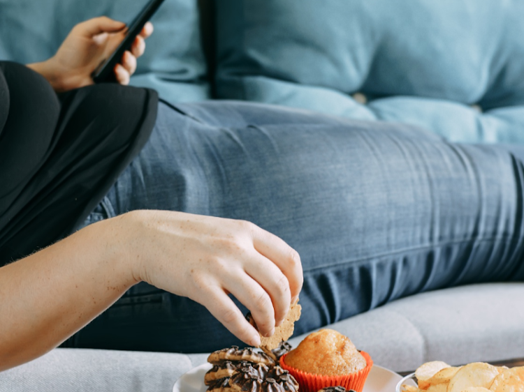 A sedentary, calorie-rich lifestyle ups the ante when it comes to diabetes, heart disease and high blood pressure. Stock photo.