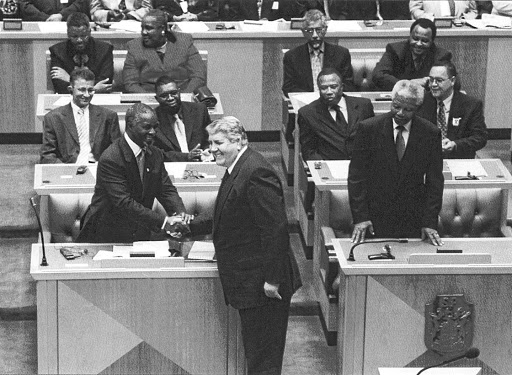 Louis Luyt, centre, shakes hands with then president Thabo Mbeki in parliament in 1999, while former president Nelson Mandela, right, looks on. Picture: SUPPLIED