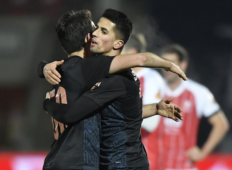 City's Eric Garcia and Joao Cancelo celebrate after the match