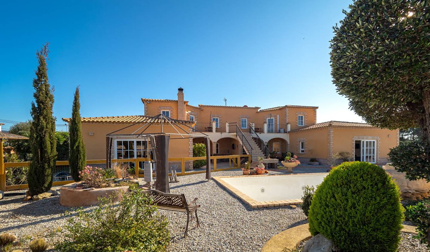 House with pool and garden Roses